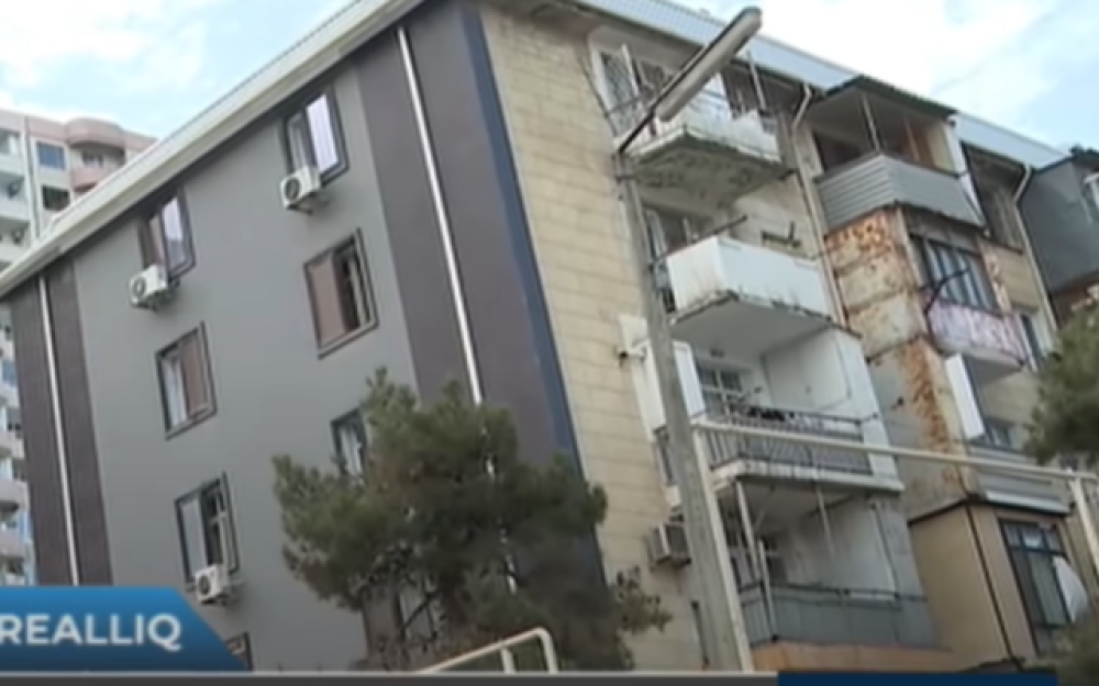 Bakıdakı təhlükəli binalar - Bəzilərinin yalnız yola baxan hissəsi təmir olunur (VİDEO)